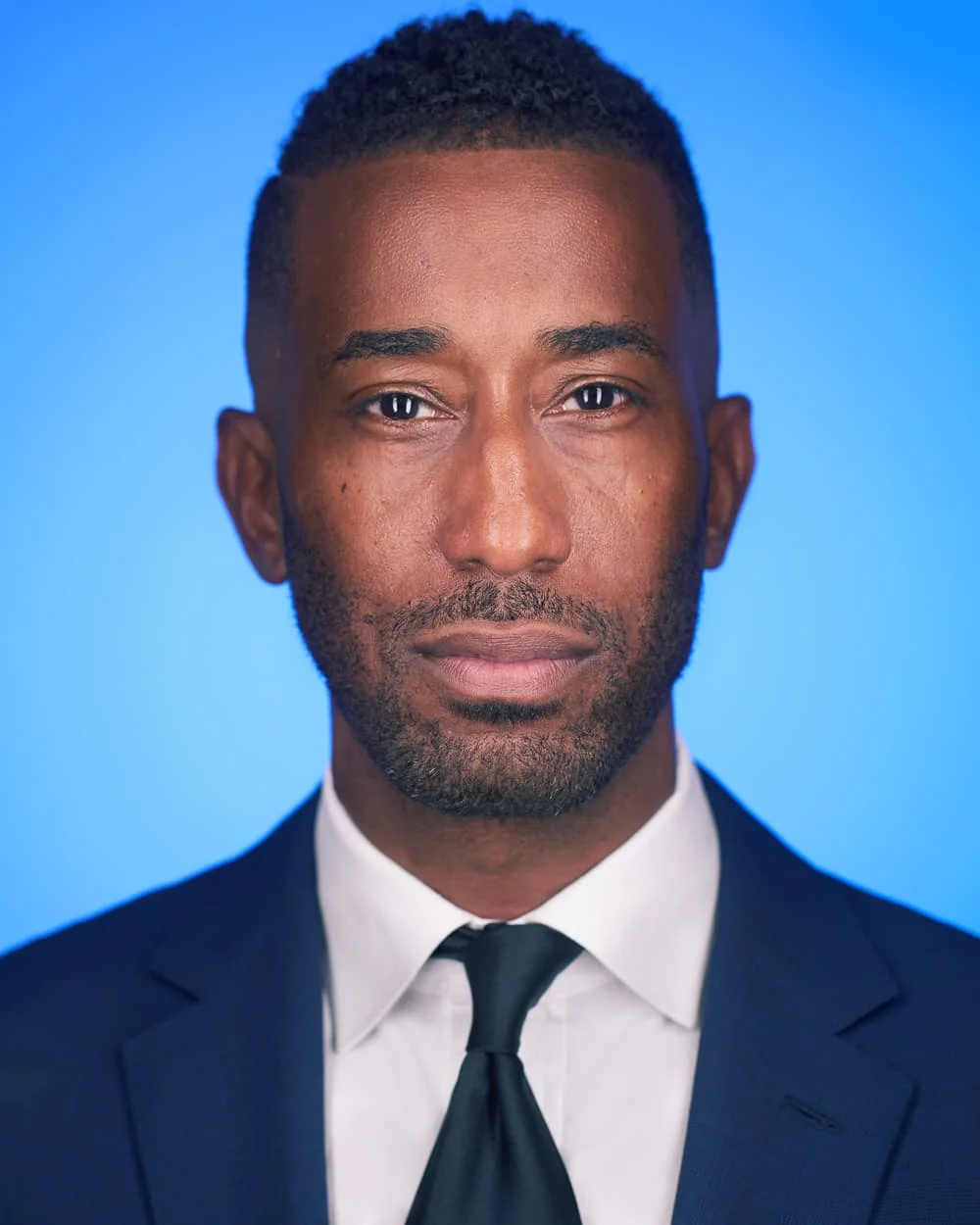 Close-up business portrait Philadelphia - professional headshot with dramatic lighting