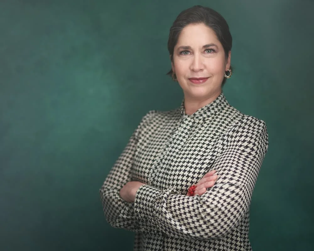 Executive headshot Philadelphia - confident professional woman arms crossed pose