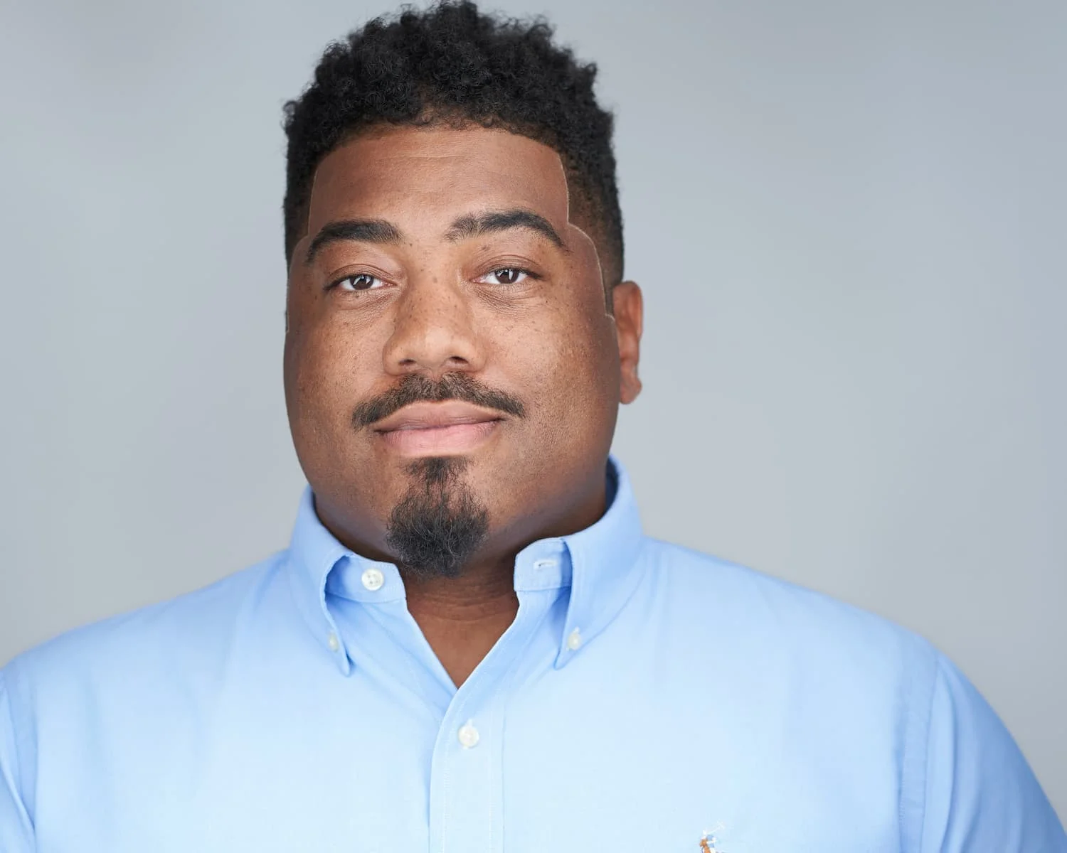 Example of properly retouched headshot maintaining natural features and skin texture