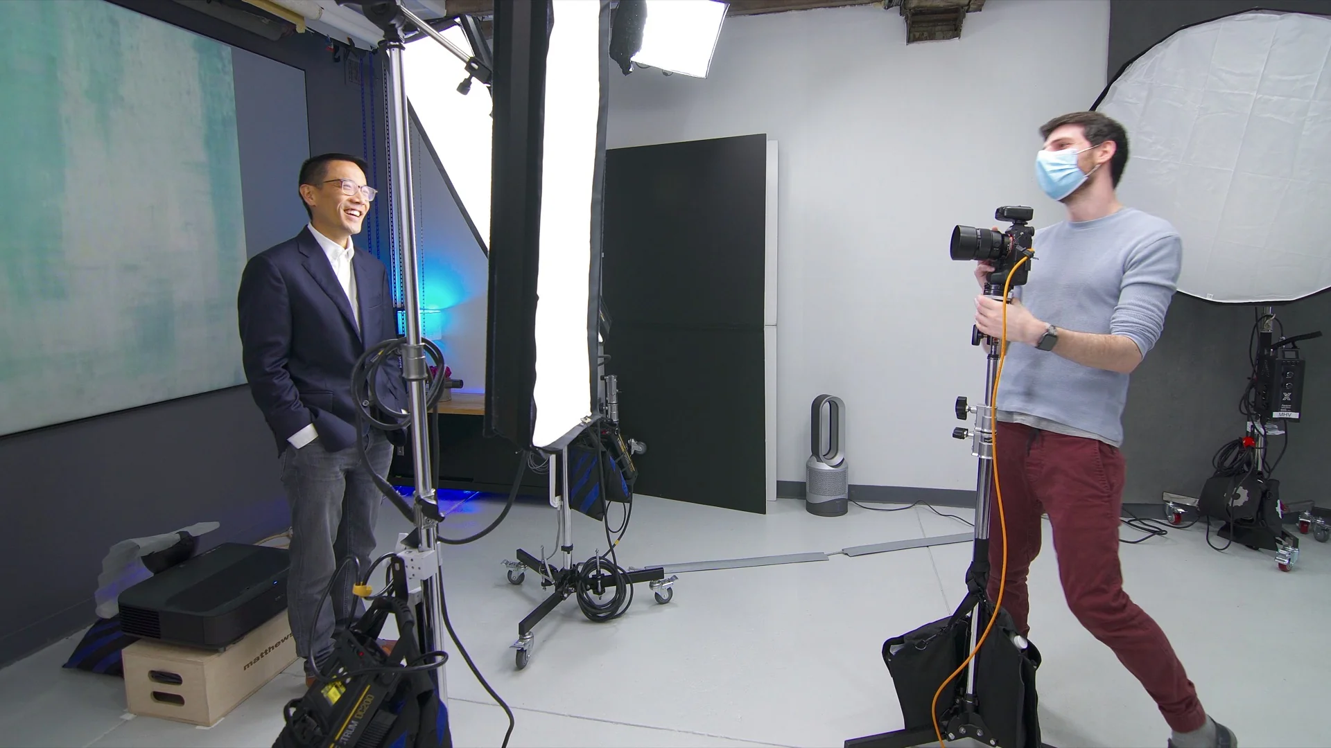 Behind-the-scenes of studio projection setup